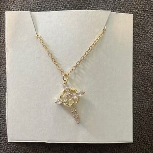 Gold Cross Necklace with Crystal Accents